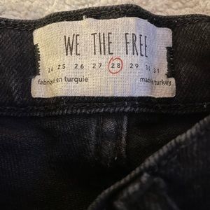 Free people denim black jeans with ripped knee detail
